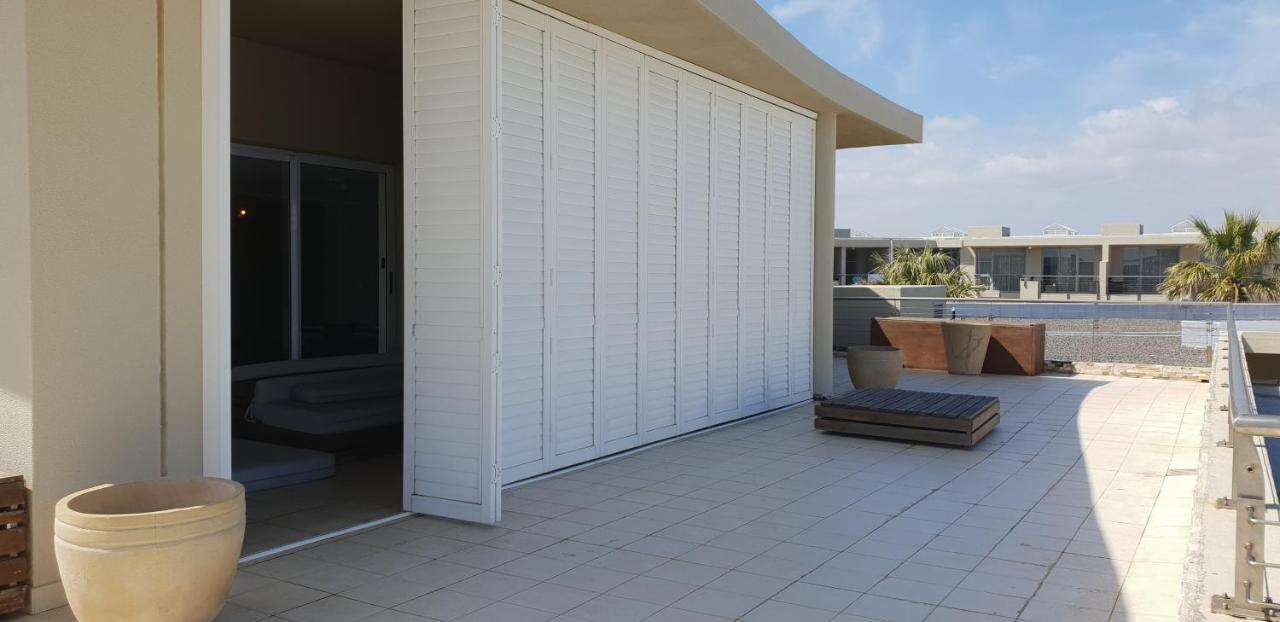 Lagoon Beach Hotel Apartments Cape Town Bagian luar foto