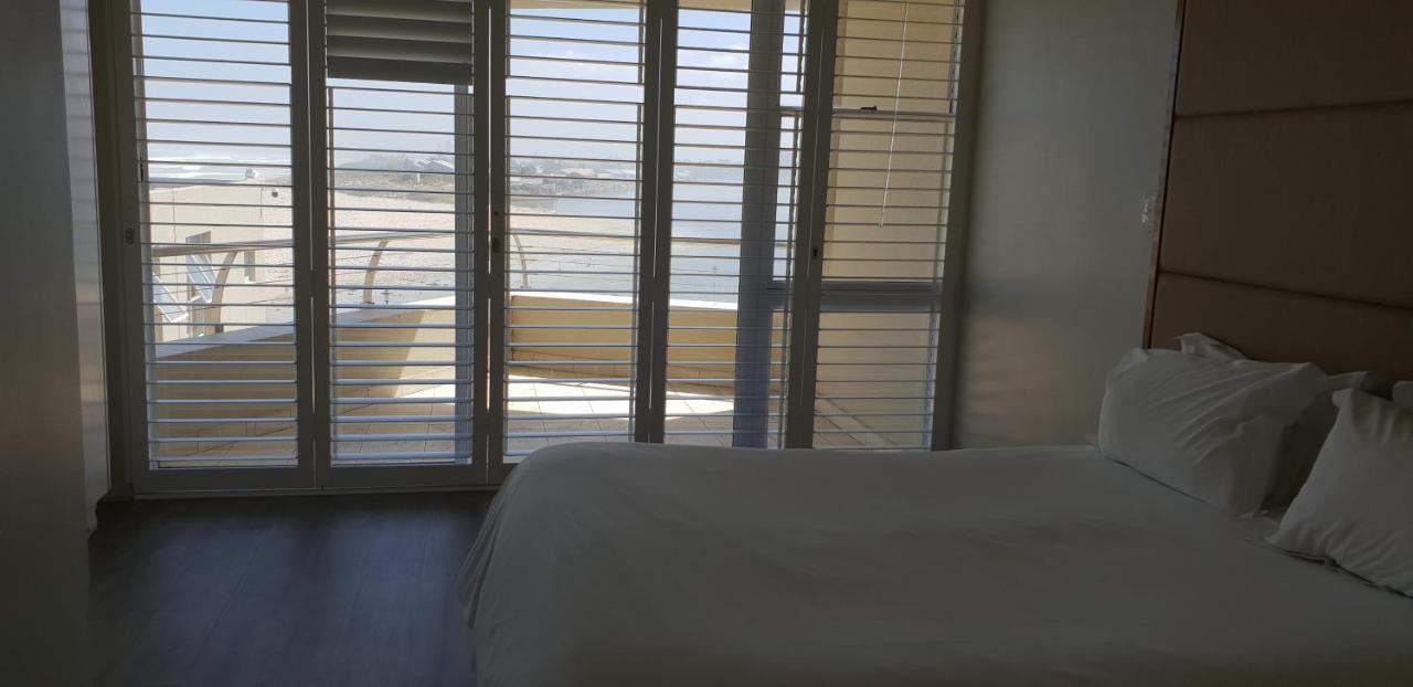 Lagoon Beach Hotel Apartments Cape Town Bagian luar foto